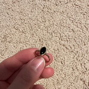 Gold and obsidian ring